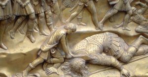 David Degollando a Goliat. Puertas del Paraíso, Baptisterio de Florencia. Toscana, Italia.